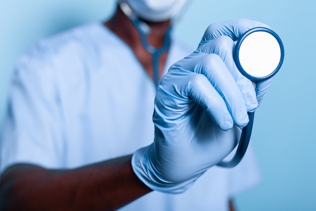Healthcare professional holding a stethoscope
